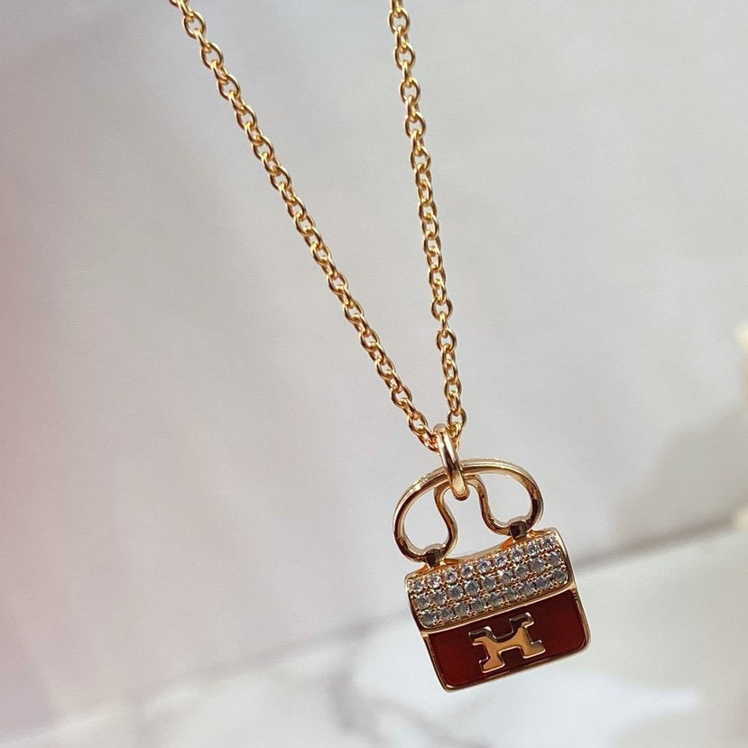 [Marin]COLLIER CONSTANCE PENDENTIF ROUGE OR ROSE