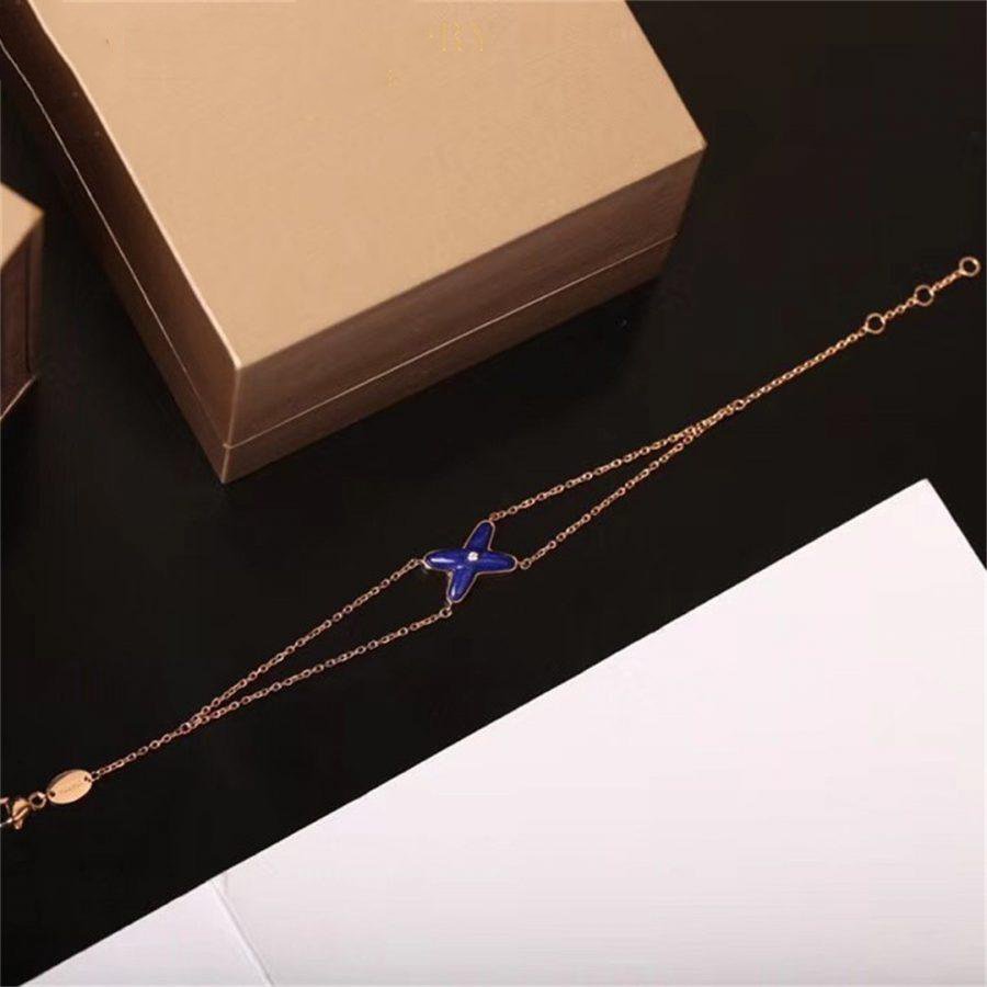 [Marin]Bague forme de fleur trèfle à quatre feuilles ajourée