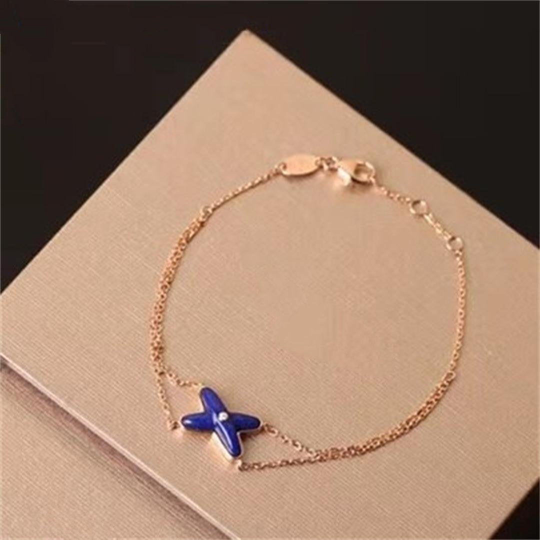 [Marin]Bague forme de fleur trèfle à quatre feuilles ajourée