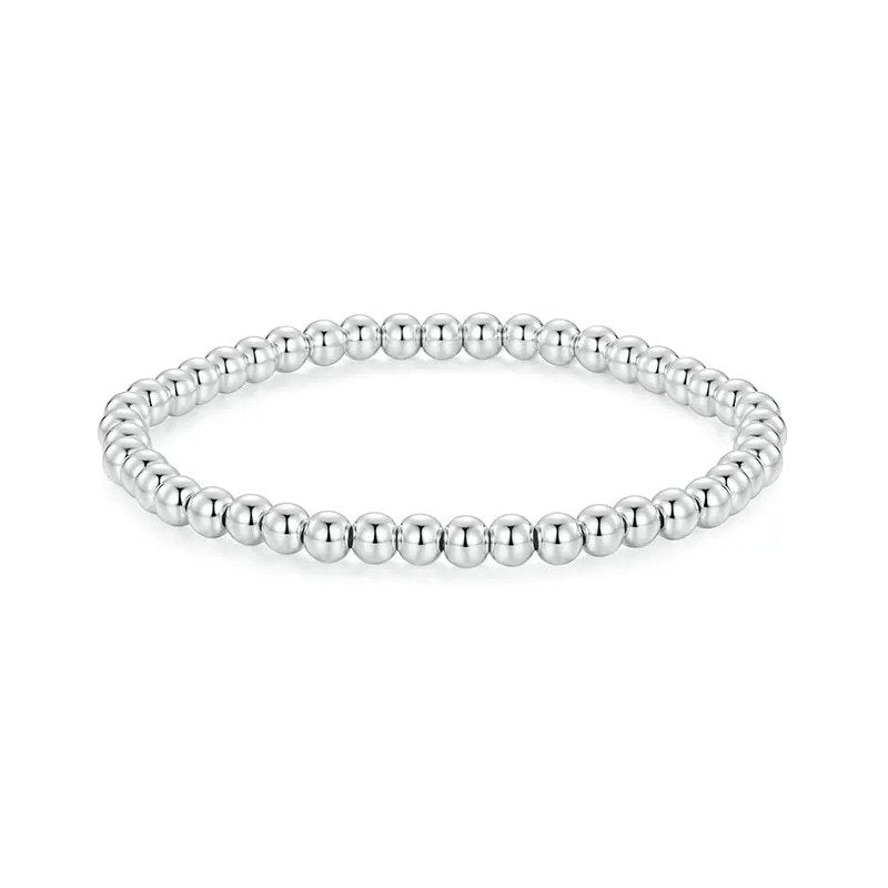 Bracelet boule de perles élastique or blanc