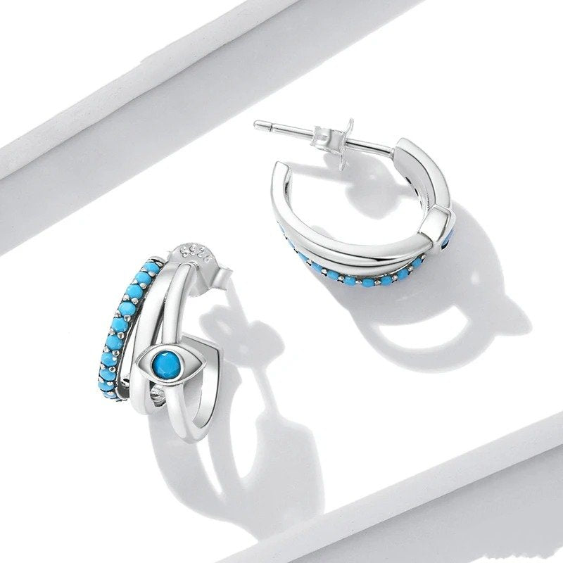 Boucles d'oreilles clous multicouches Œil du Diable